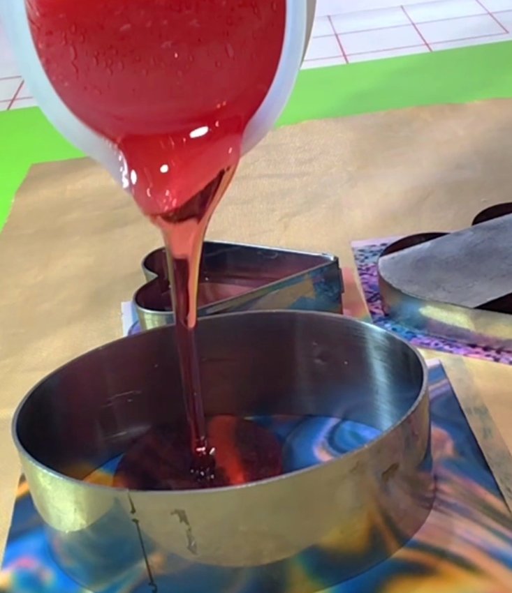 Pour isomalt into metal cookie cutters.